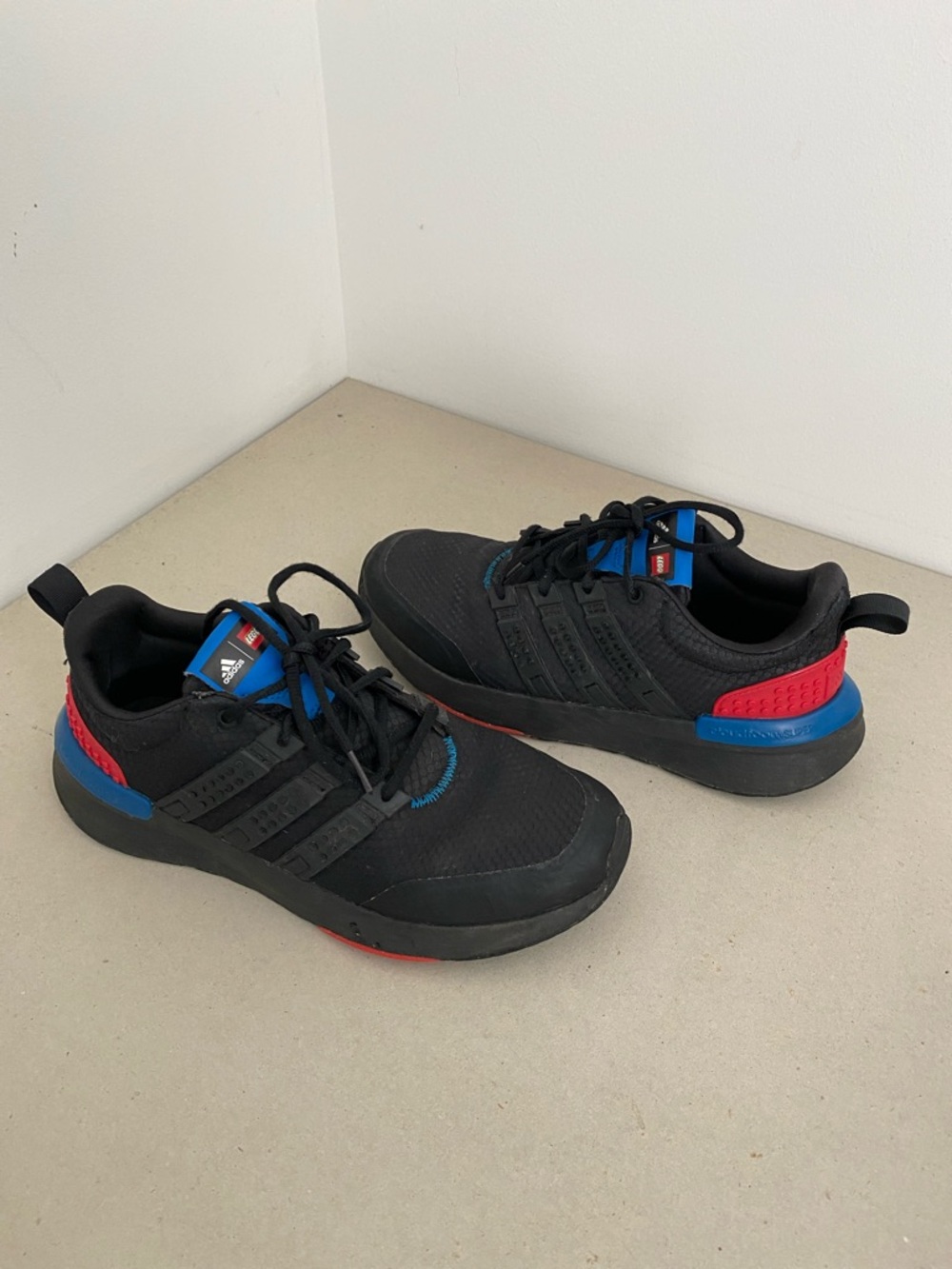 adidas | Lego Racer TR2 Black Sneakers with Blue and Red Accents